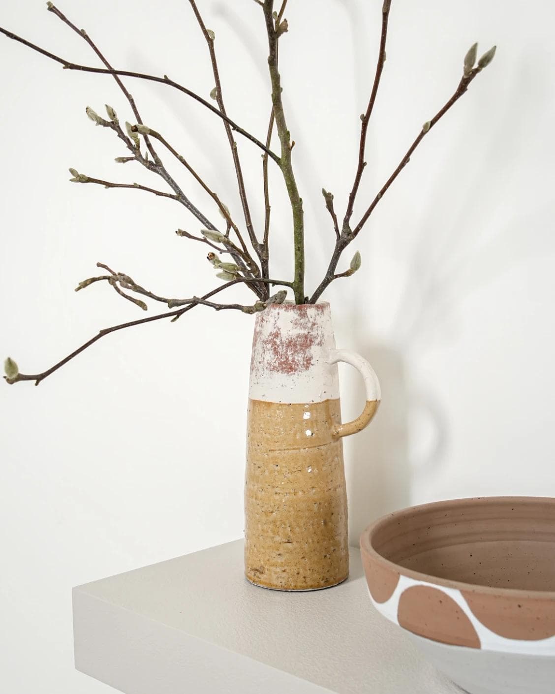 Leva Terra vases in white and beige, shown in a lifestyle right view as image 6