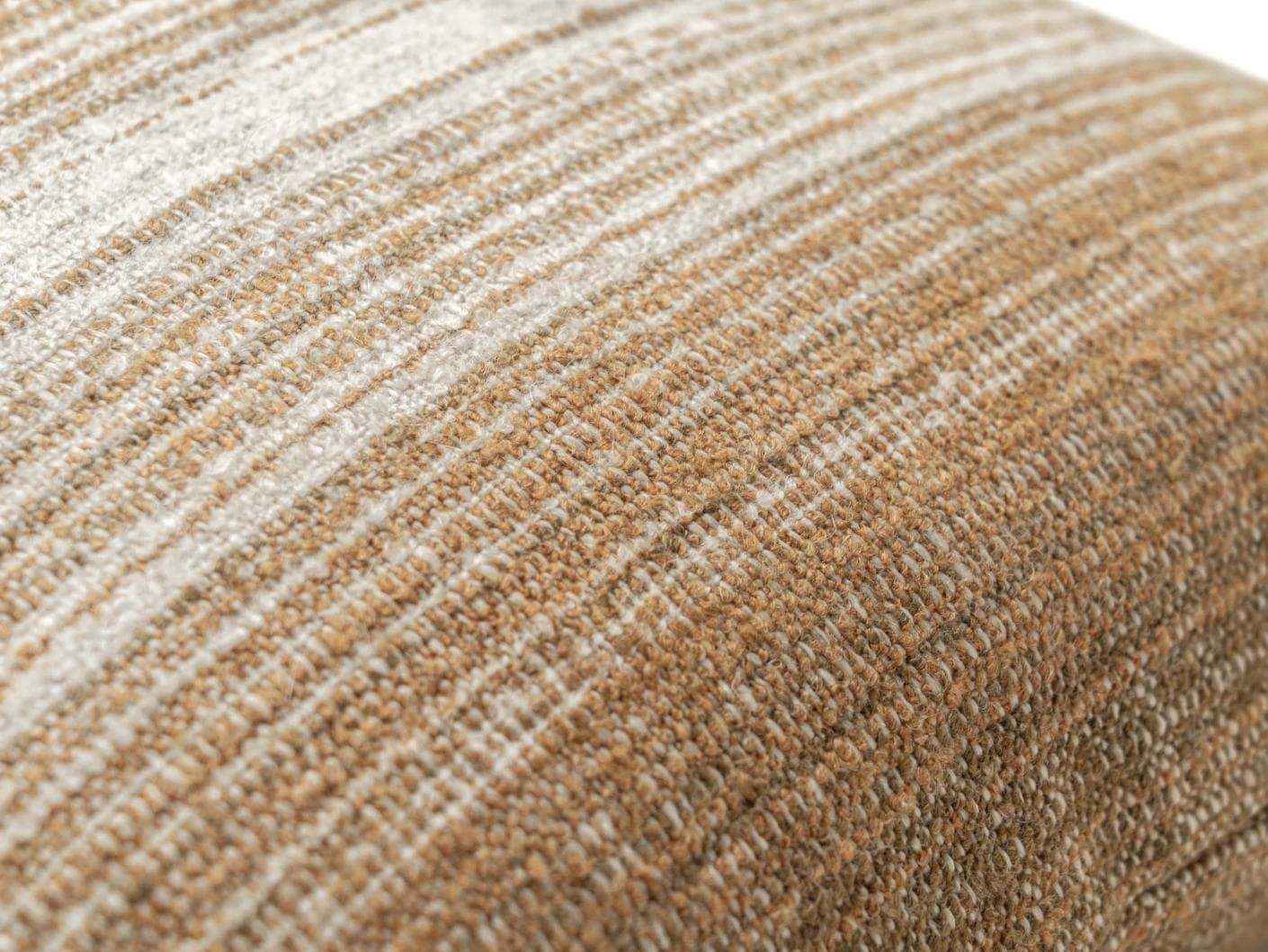 Lia Ember cushion in brown, shown in a product close-up as image 6