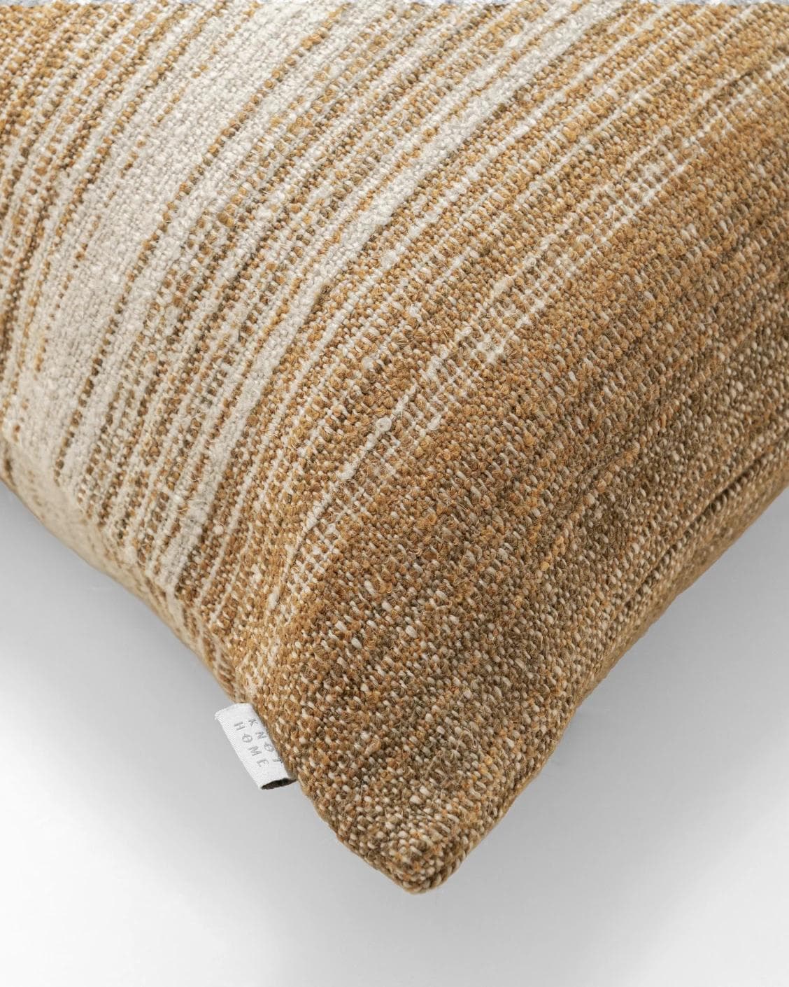 Lia Ember cushion in brown, shown in a product top view as image 9