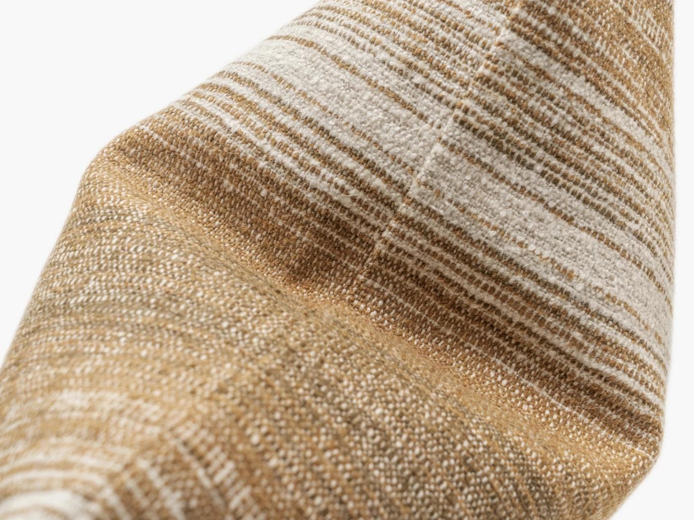 Lia Ember cushion in brown, shown in a product top view as image 10