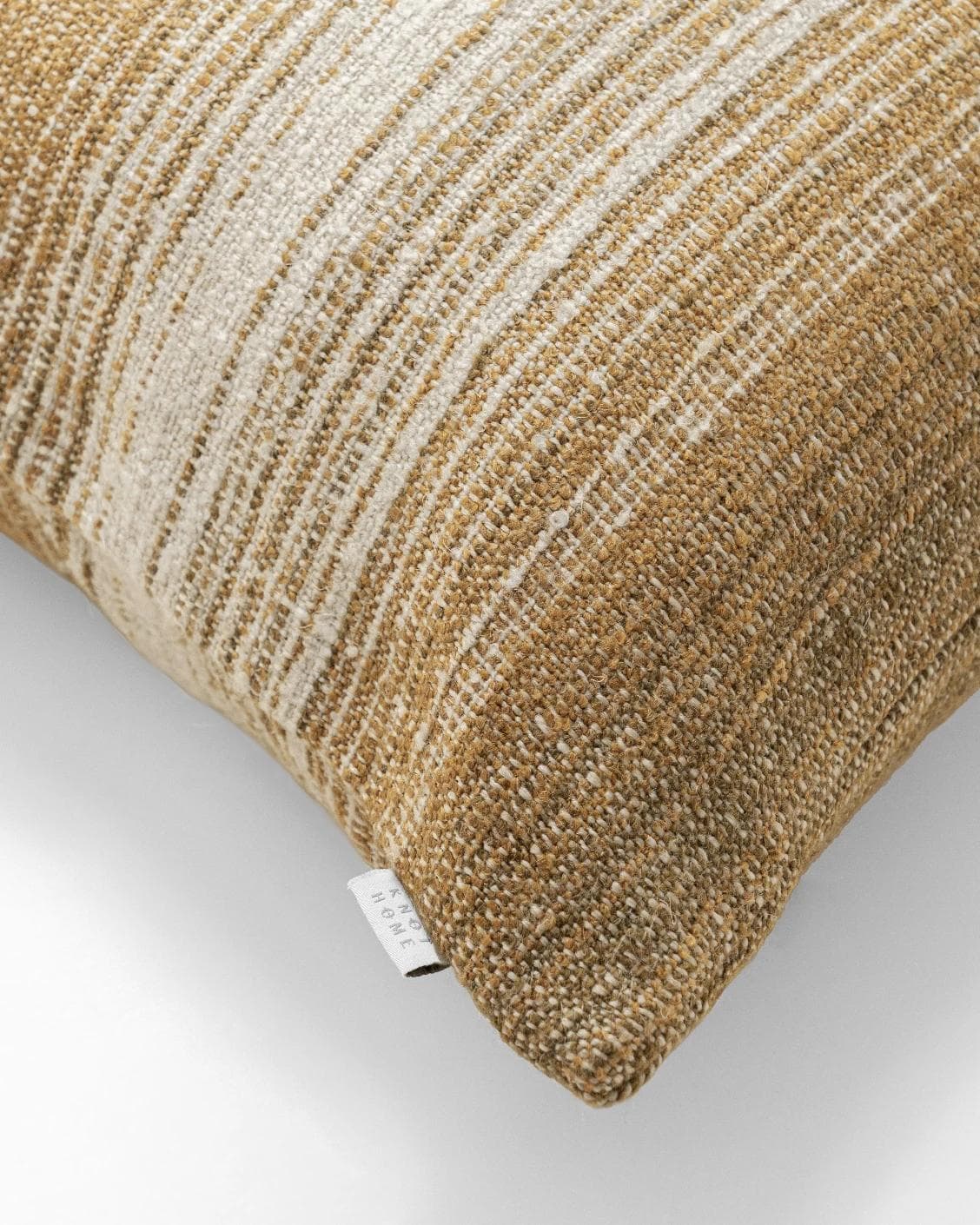 Lia Ember III cushion in cream, shown in a product close-up top view as image 6
