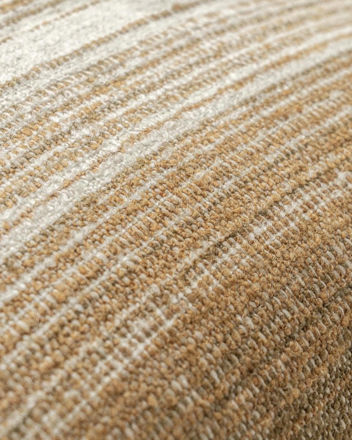 Lia Ember III cushion in cream, shown in a product close-up top view as image 7