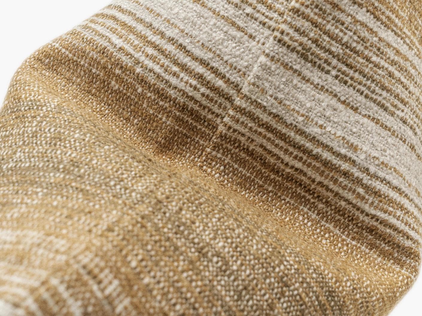 Lia Ember III cushion in cream, shown in a product top view as image 10