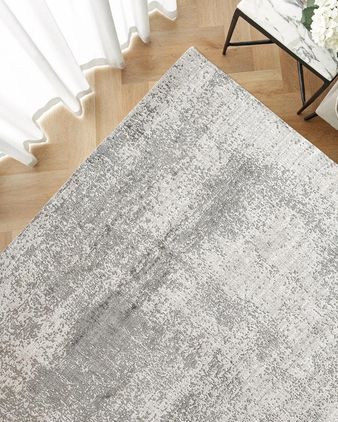Liam Alba carpet in grey, shown in a lifestyle top view as image 2
