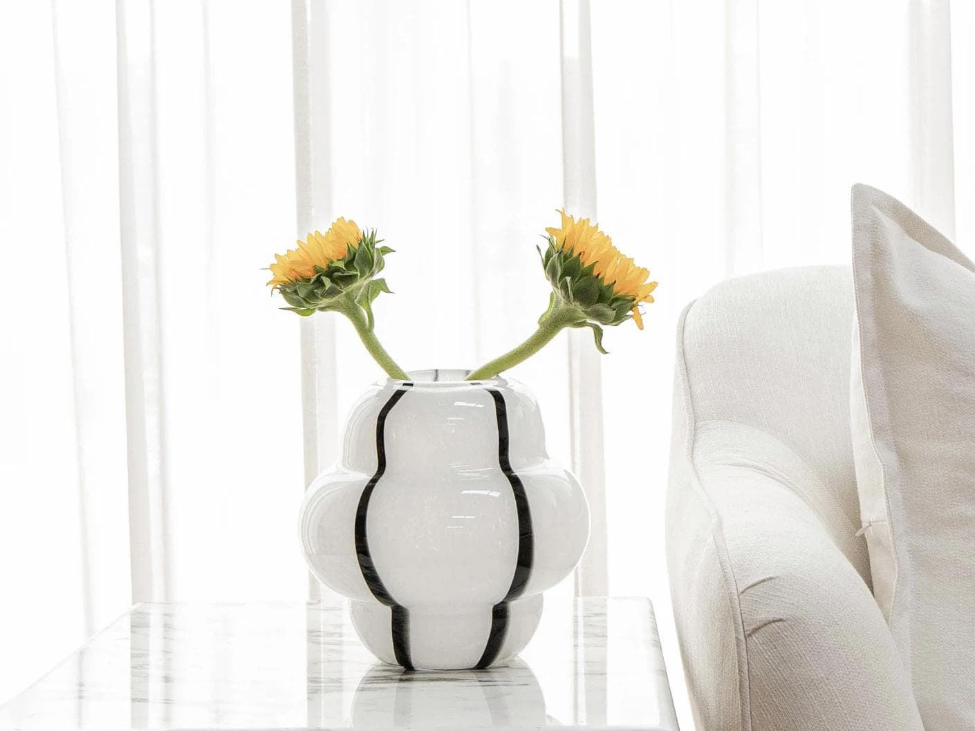 Linea Storms vases in black and ivory, shown in a lifestyle front view as image 4