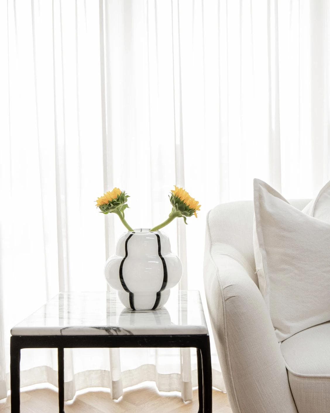 Linea Storms vases in black and ivory, shown in a lifestyle front view as image 4