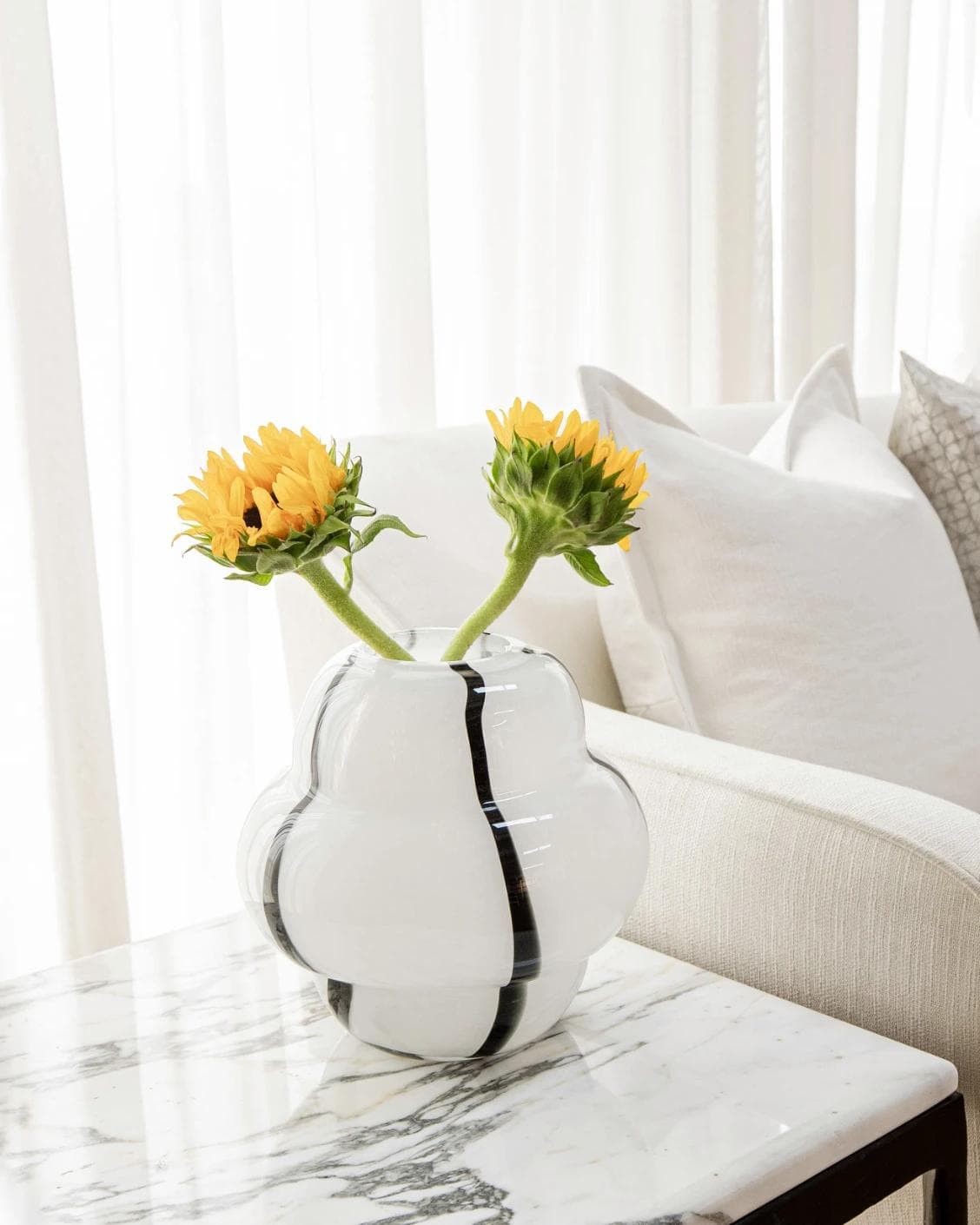 Linea Storms vases in black and ivory, shown in a lifestyle left view as image 5