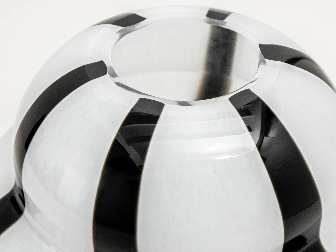 Linea Storms vases in black and ivory, shown in a product close-up top view as image 7