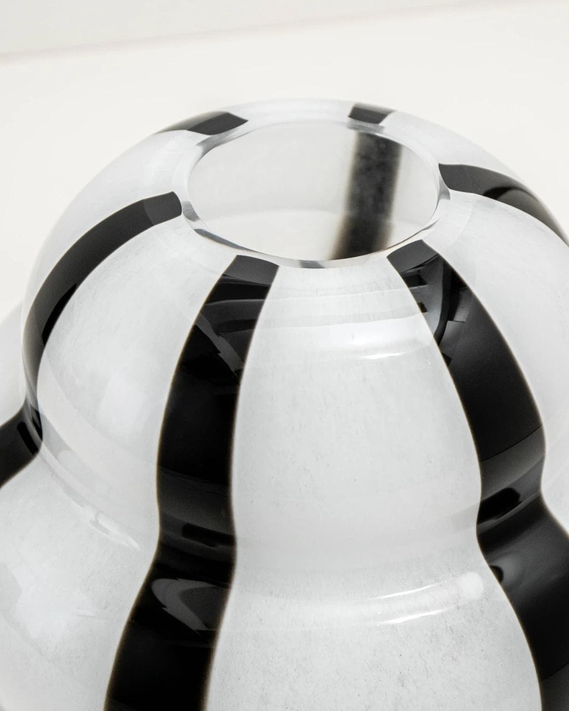 Linea Storms vases in black and ivory, shown in a product close-up top view as image 7