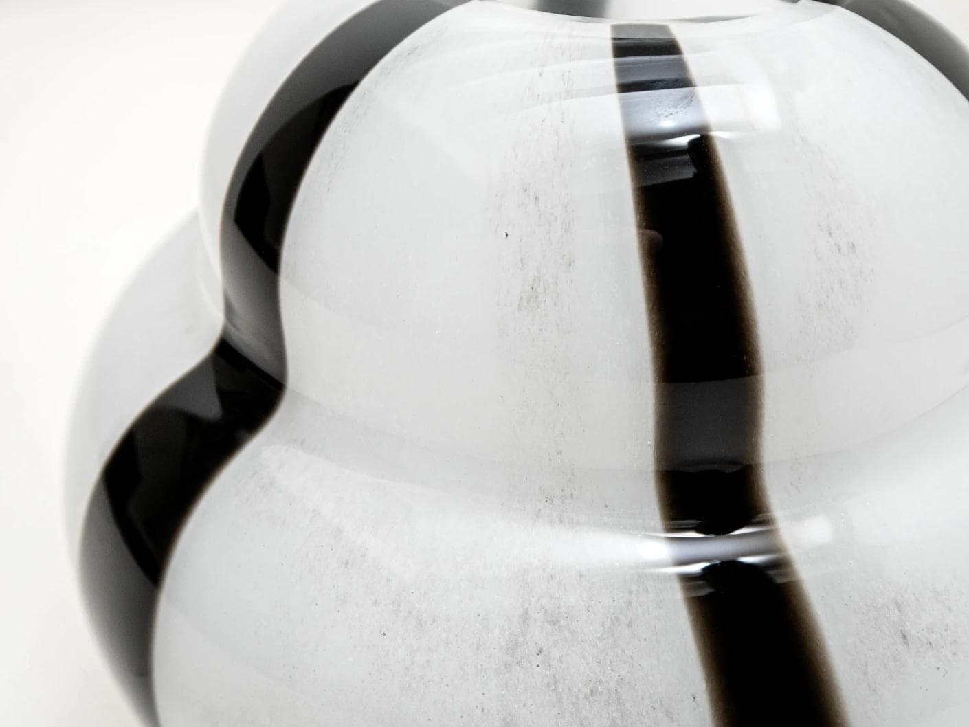 Linea Storms vases in black and ivory, shown in a product close-up top view as image 8