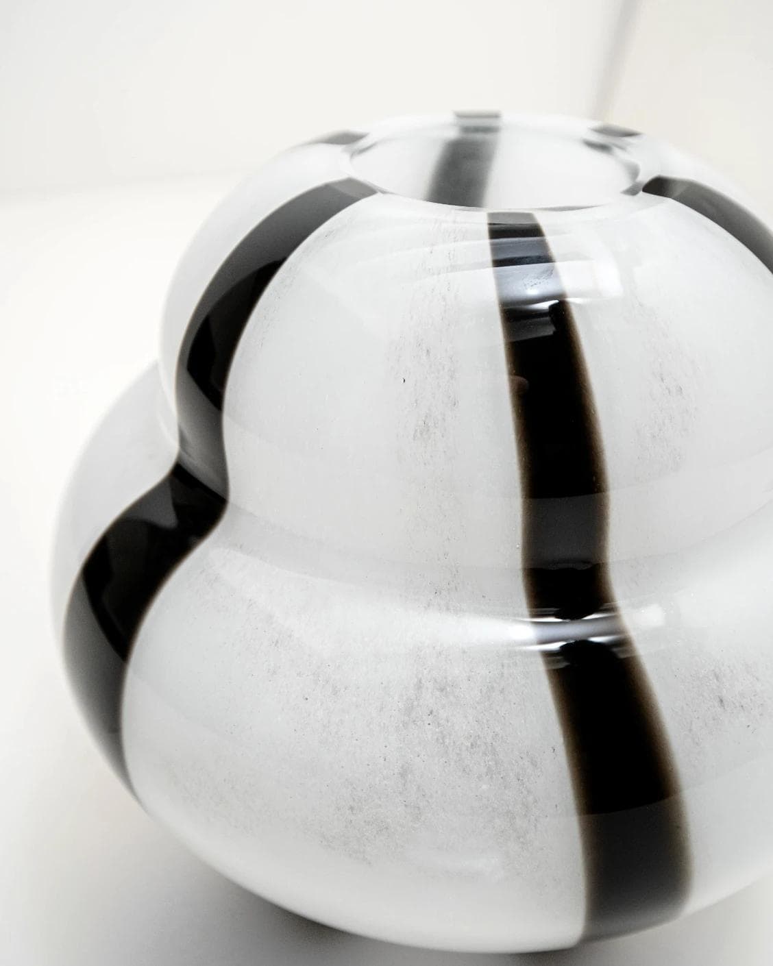 Linea Storms vases in black and ivory, shown in a product close-up top view as image 8