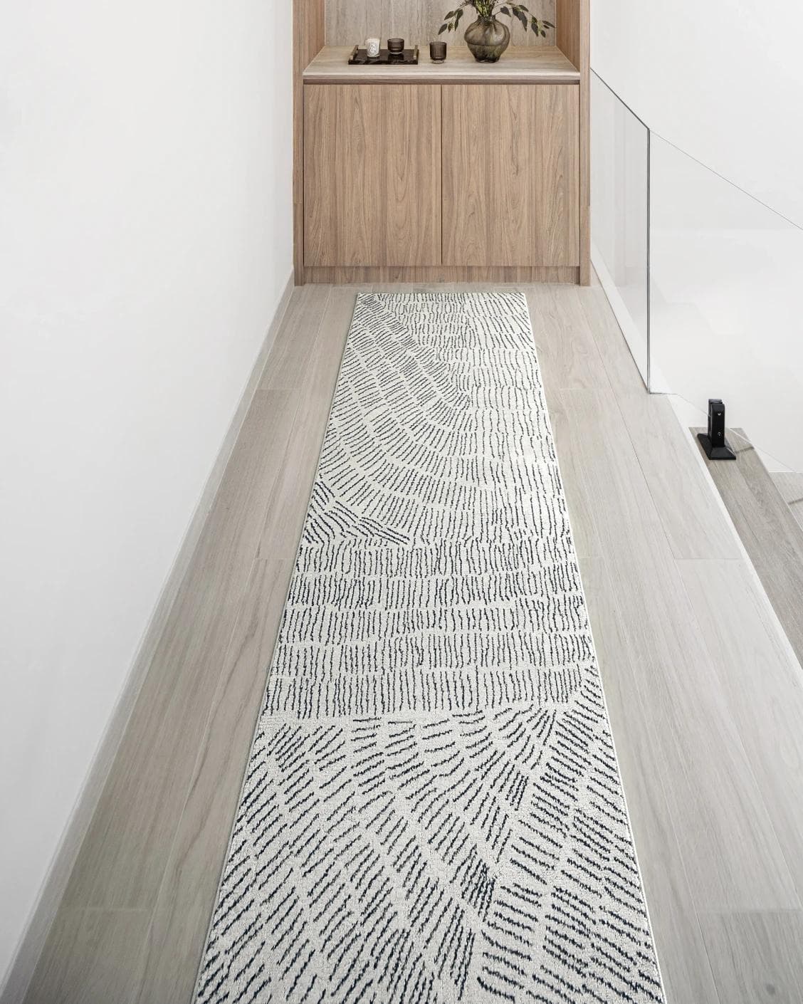 Link Fume Runners carpet in grey, shown in a lifestyle front view