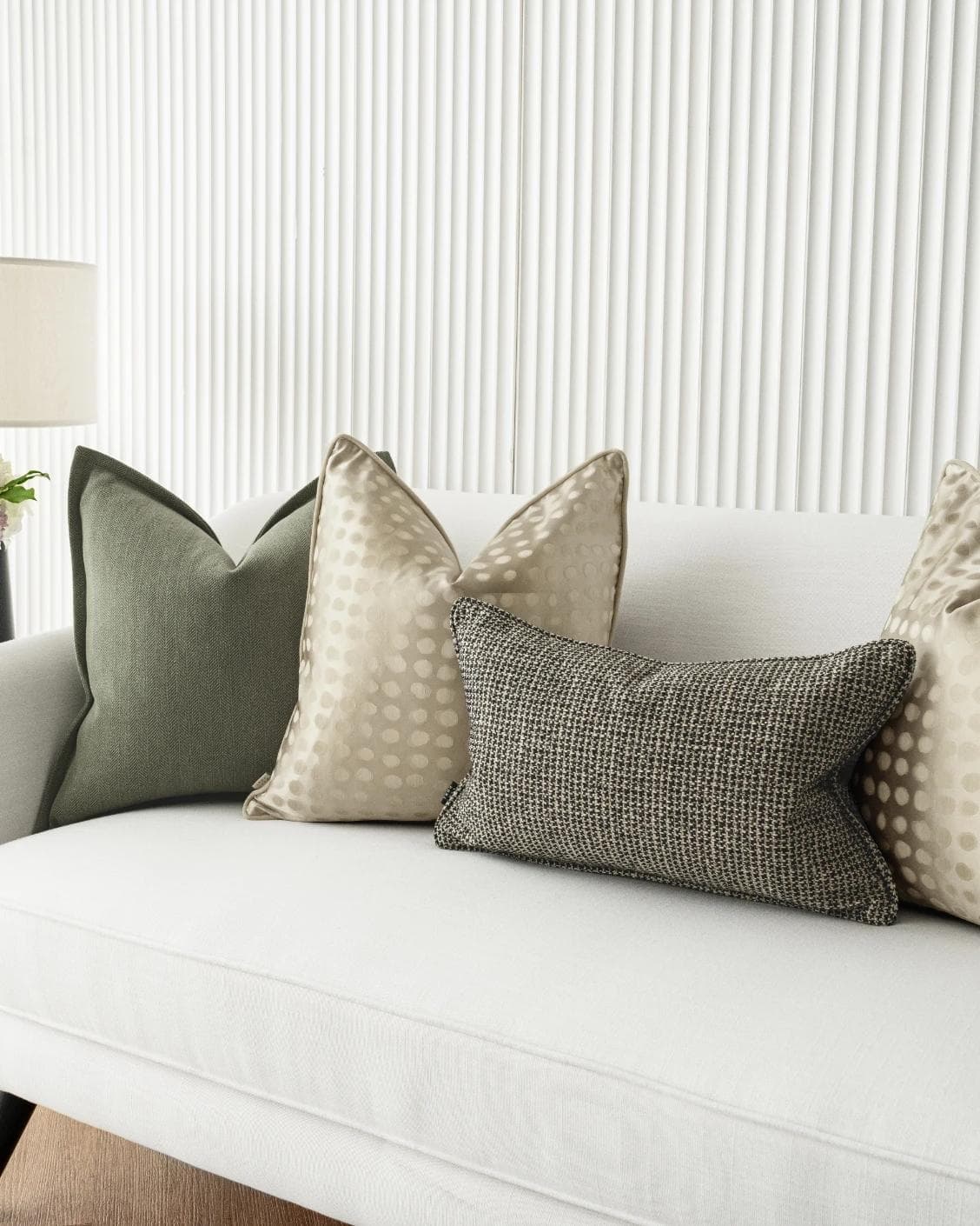 Lirika Bundle cushion in black, green, beige and gold, shown in a product right view as image 6
