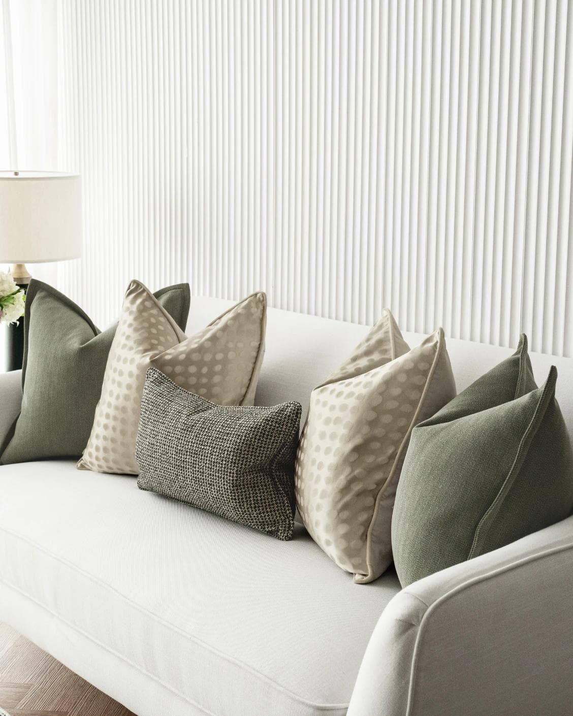 Lirika Bundle cushion in black, green, beige and gold, shown in a product right view as image 7