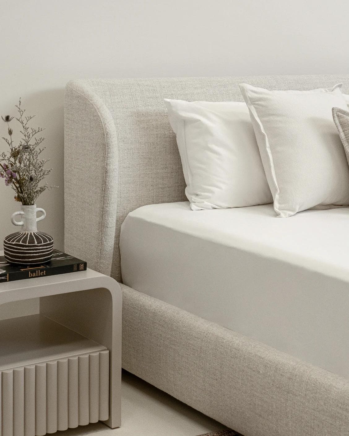Livia Soft Off-White bed frame in off white, shown in a lifestyle left view as image 7