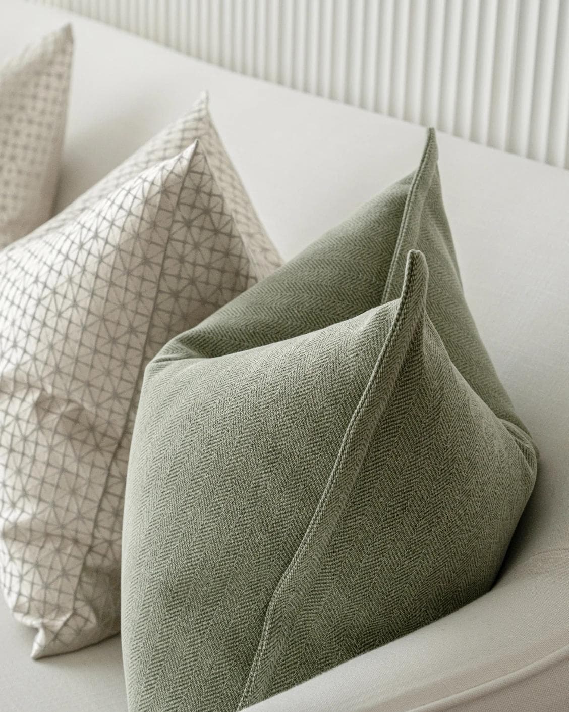 Lloyd Bundle cushion in silver, white and green, shown in a product right view as image 7