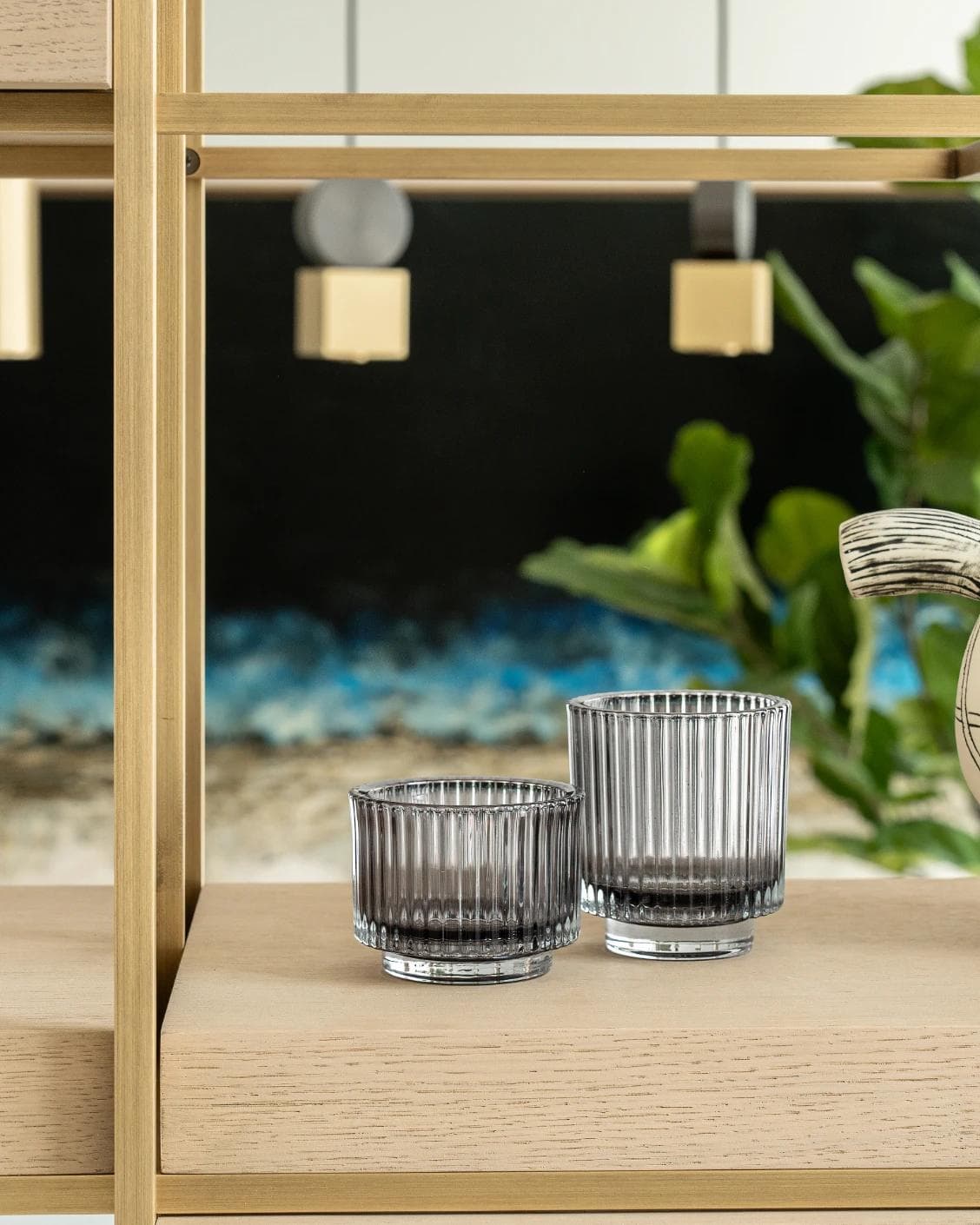 Loucille Storms candle holders in grey, shown in a lifestyle front view as image 4