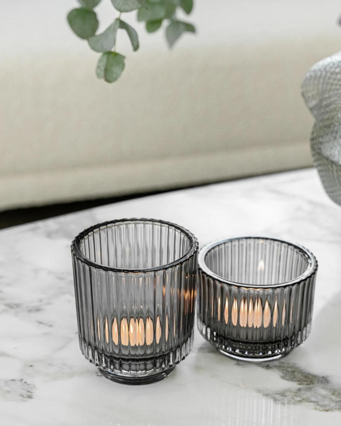 Loucille Storms candle holders in grey, shown in a lifestyle left view as image 5