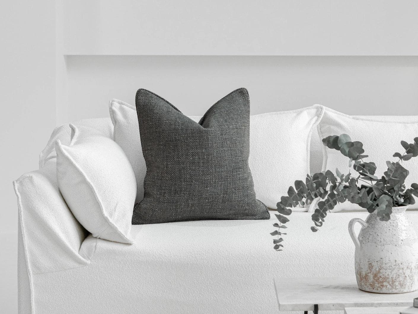 Lynn Canova cushion in blue, shown in a lifestyle front view as image 4