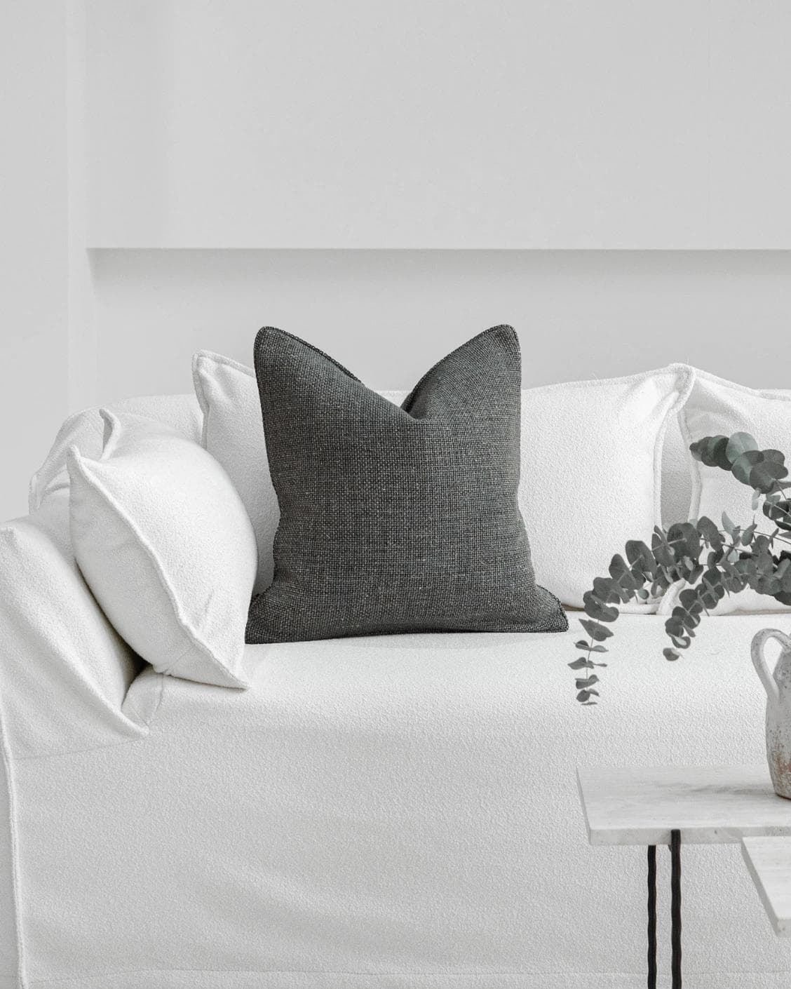 Lynn Canova cushion in blue, shown in a lifestyle front view as image 4