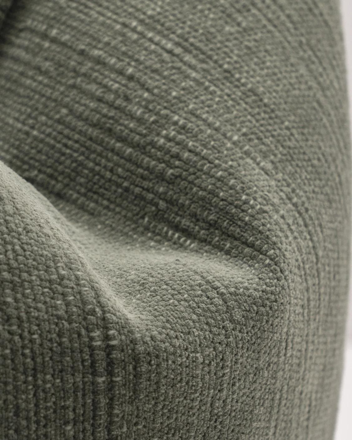 Macey Jade cushion in grey and green, shown in a product close-up as image 8