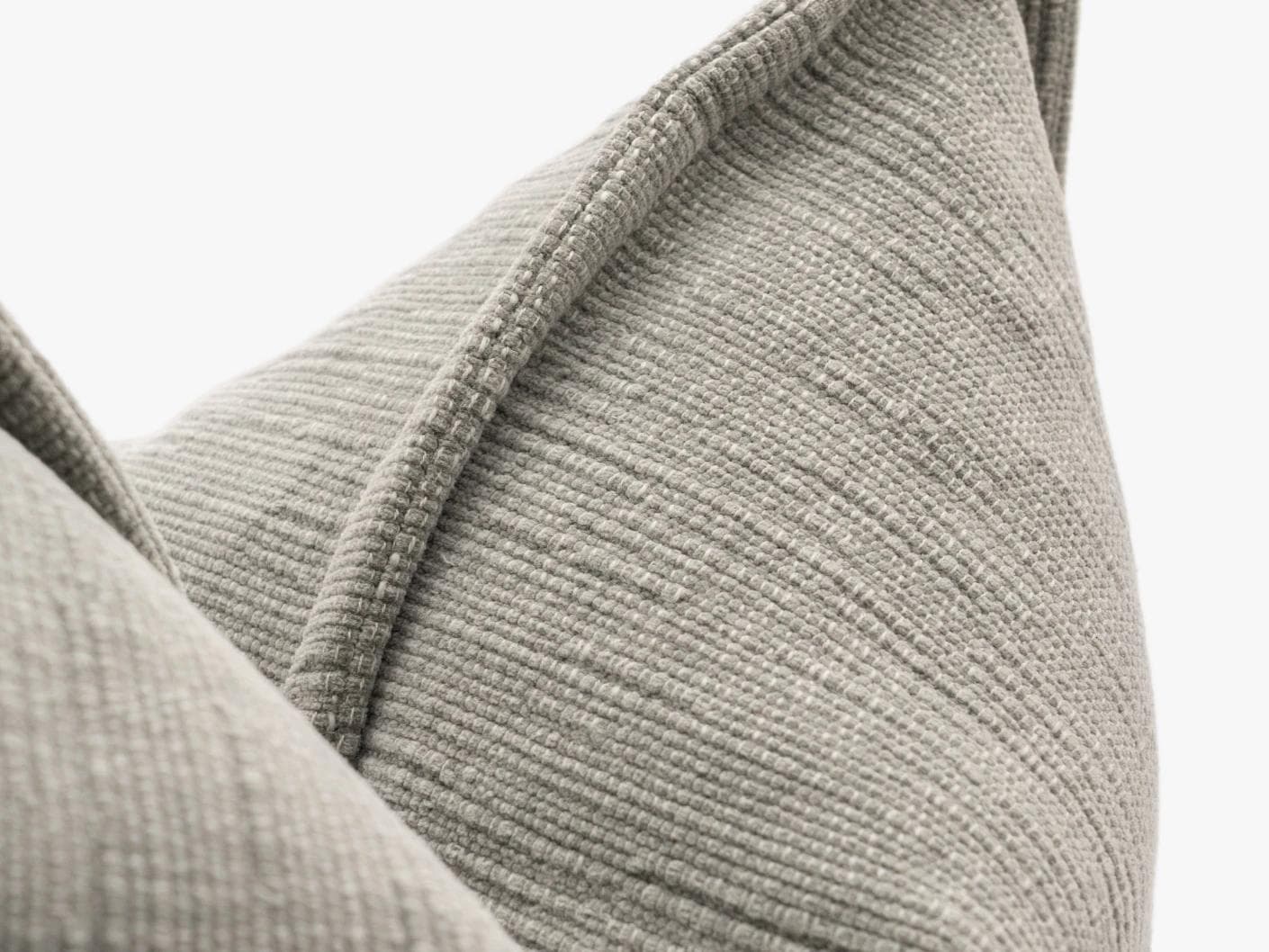 Macey Laurent cushion in grey, shown in a product close-up as image 7