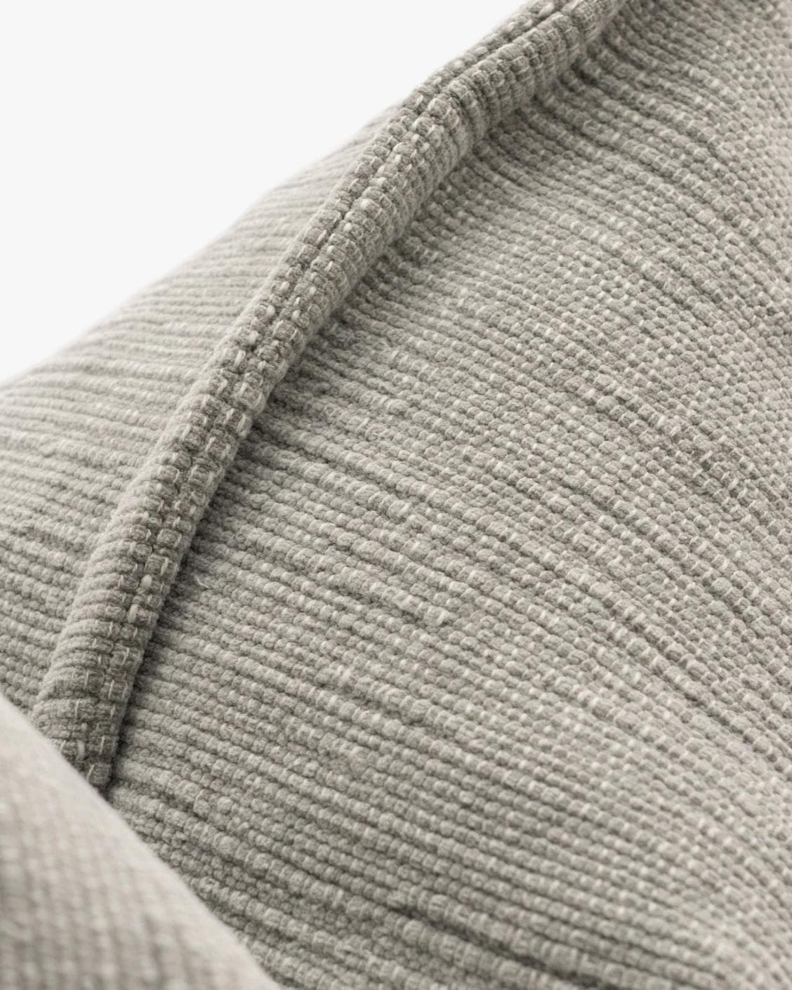 Macey Laurent cushion in grey, shown in a product close-up as image 7