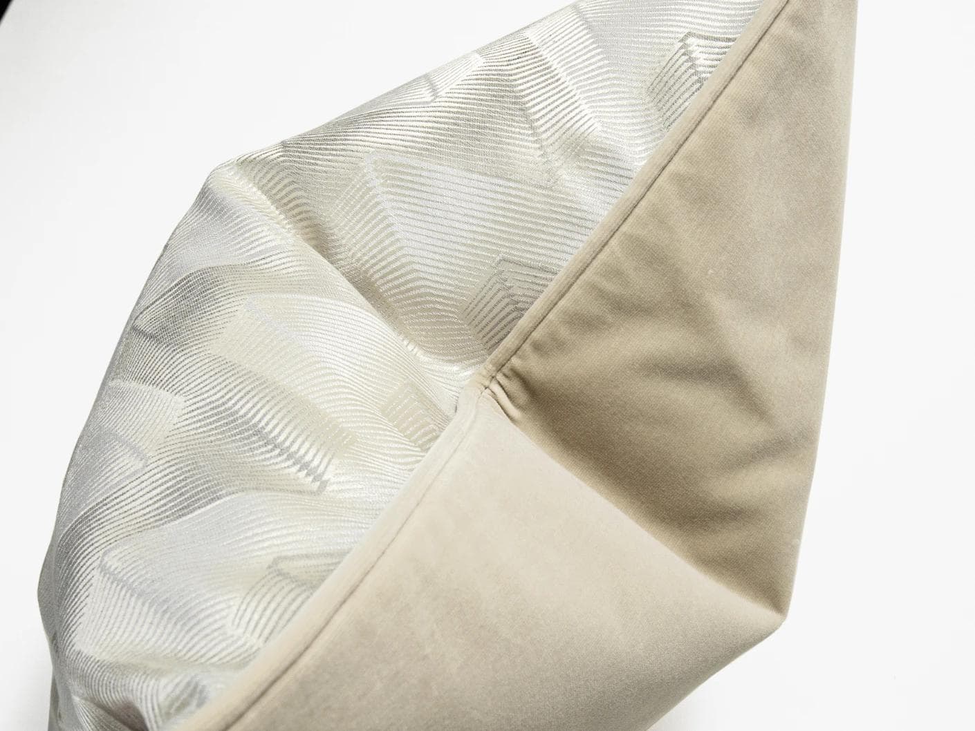 Maisie River cushion in beige and silver, shown in a product top view as image 9