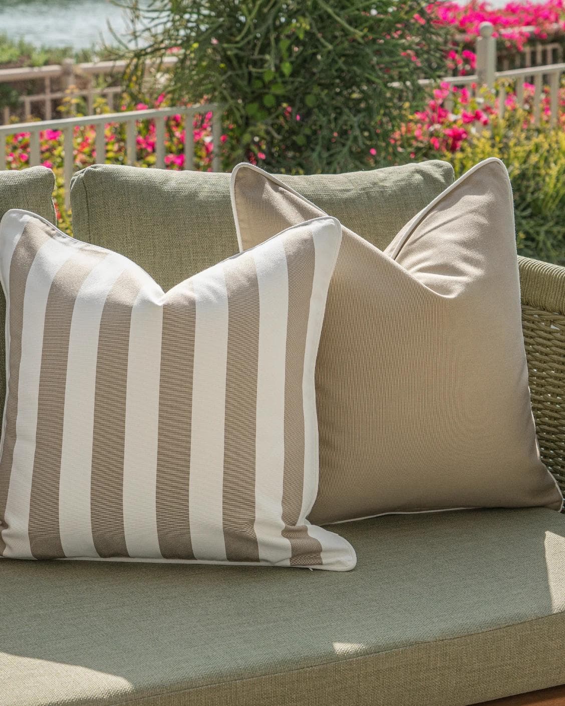 Manha Bundle cushion in rust and beige, shown in a lifestyle left view as image 6