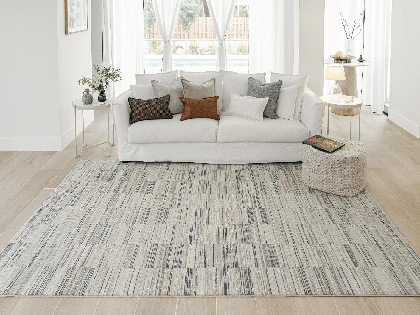 Marco Stone carpets in beige and grey, shown in a lifestyle front view as image 1