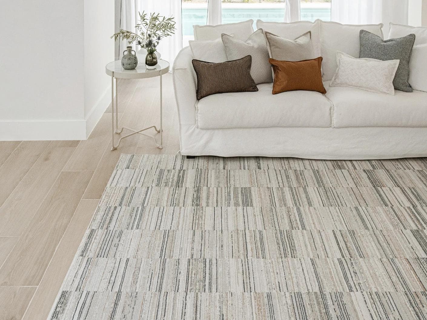 Marco Stone carpets in beige and grey, shown in a lifestyle front view as image 2