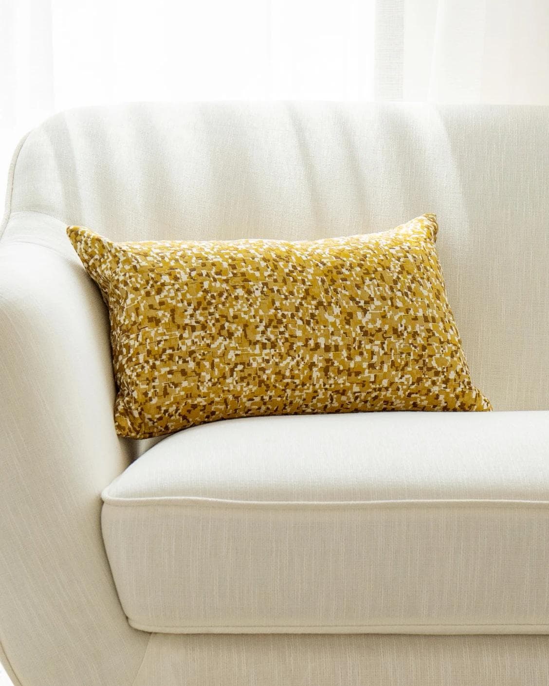 Marigold Klimt cushion in gold and yellow, shown in a lifestyle front view as image 5