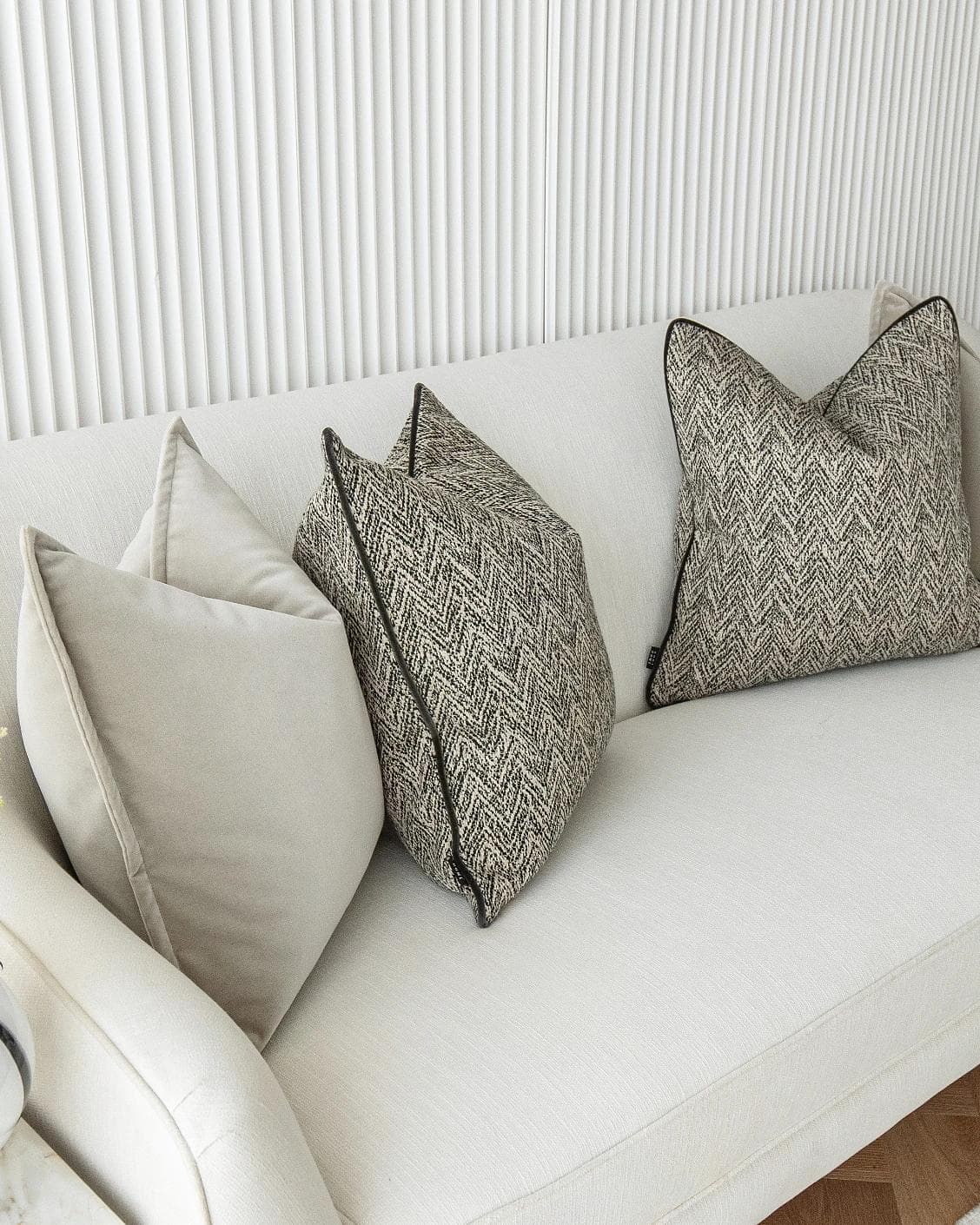 Marilee Bundle cushion in brown, grey and black, shown in a product left view as image 7