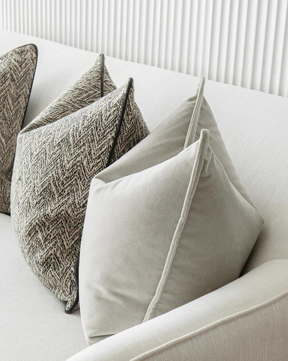 Marilee Bundle cushion in brown, grey and black, shown in a product right view as image 8