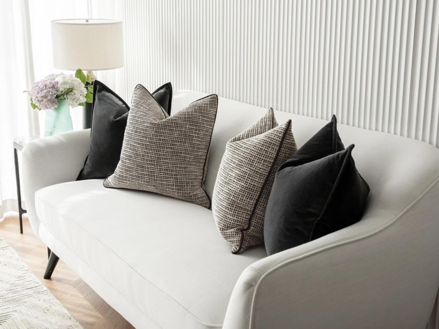 Martina Bundle cushion in grey and black, shown in a lifestyle right view as image 5