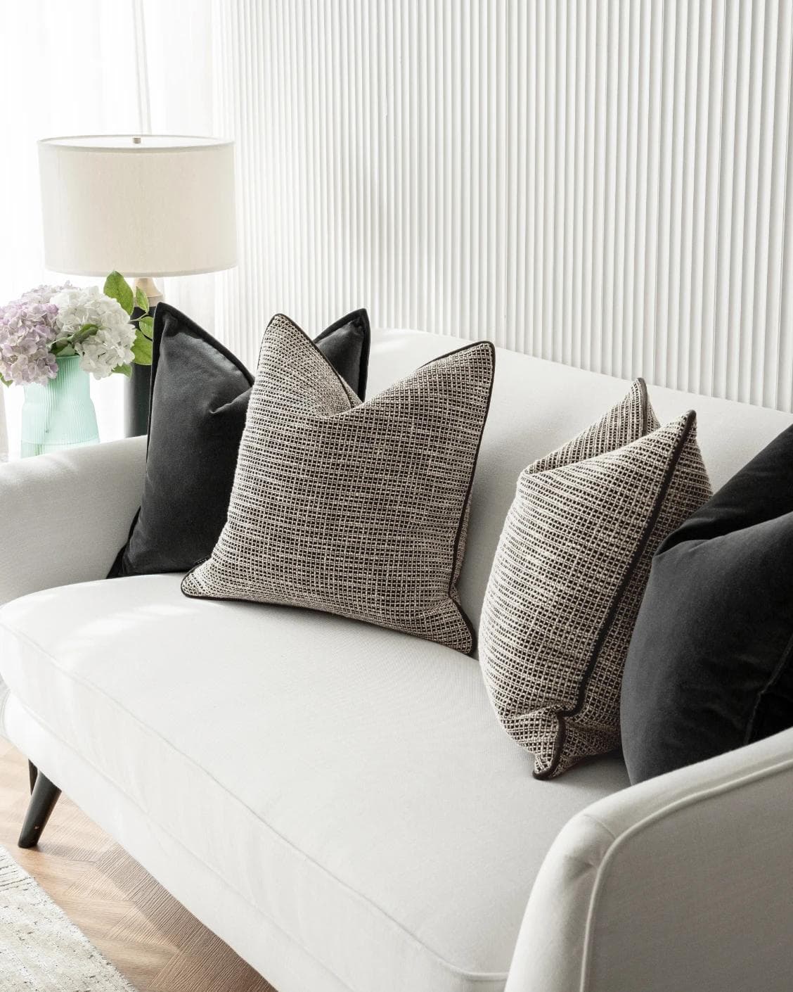 Martina Bundle cushion in grey and black, shown in a lifestyle right view as image 5