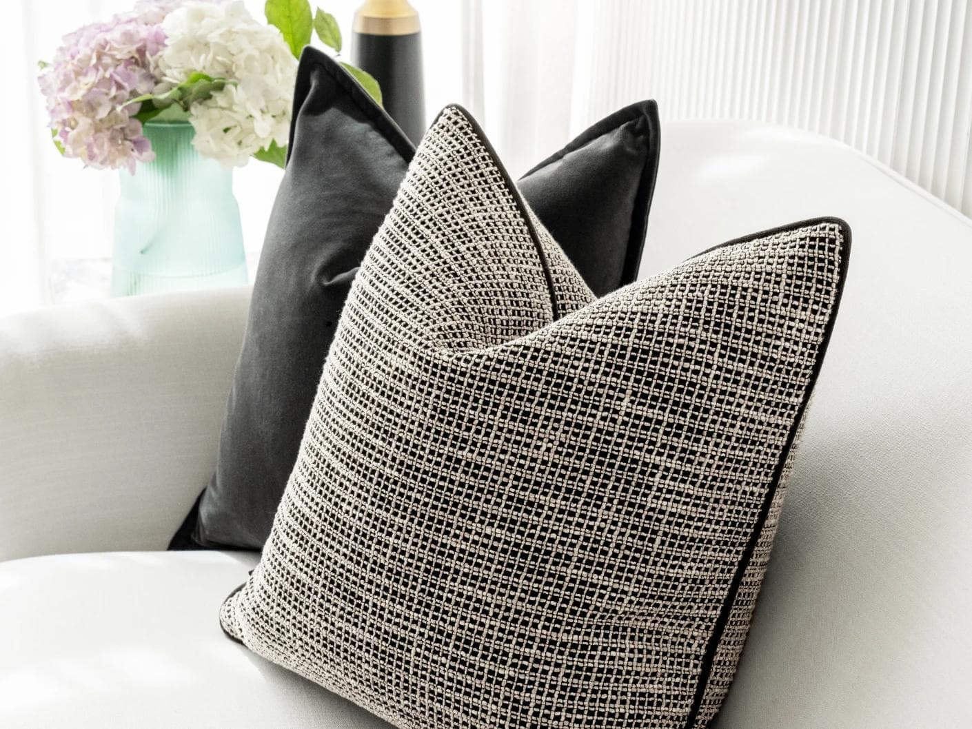 Martina Bundle cushion in grey and black, shown in a lifestyle right view as image 6