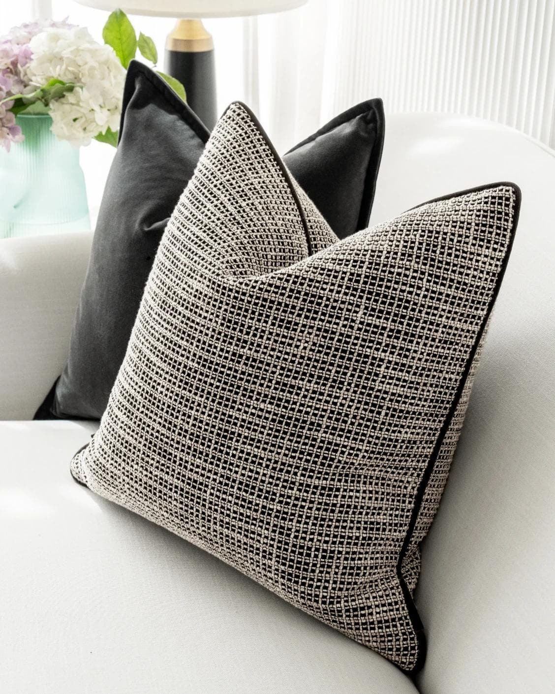 Martina Bundle cushion in grey and black, shown in a lifestyle right view as image 6