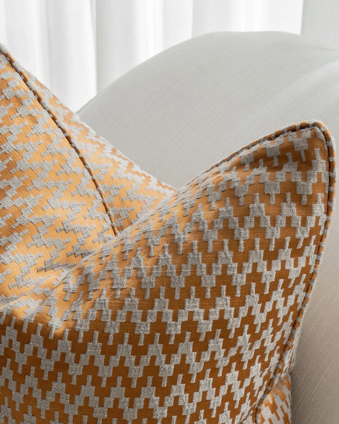 Maxene Hodler cushion in orange, shown in a lifestyle top view as image 5