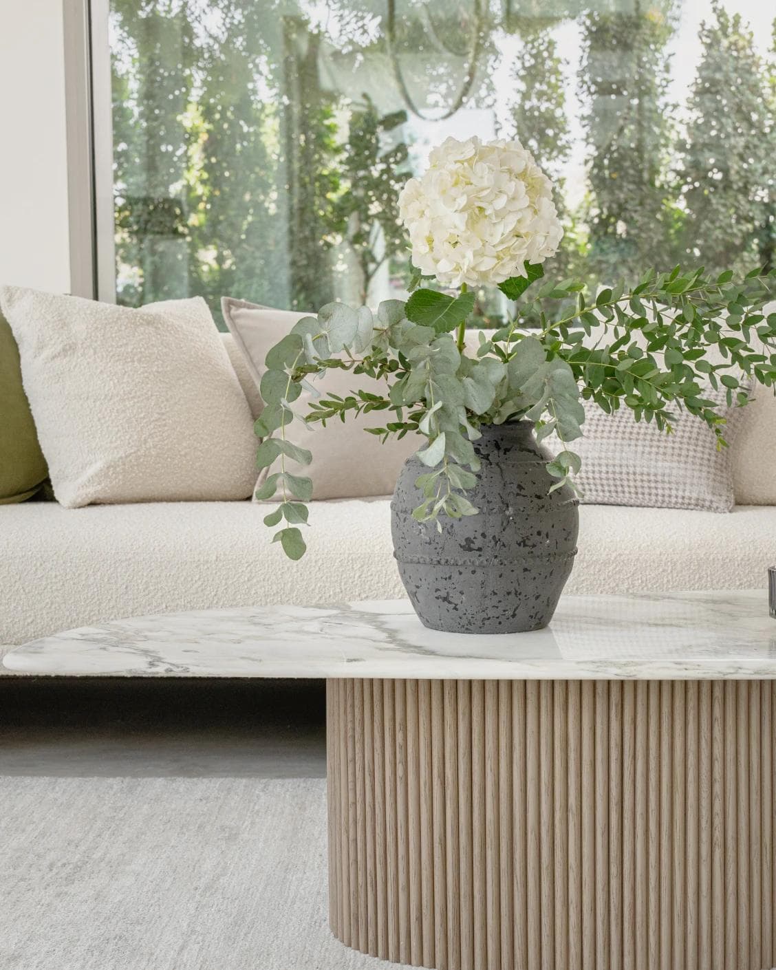 Maxwell Arneson vases in grey, shown in a lifestyle front view as image 2