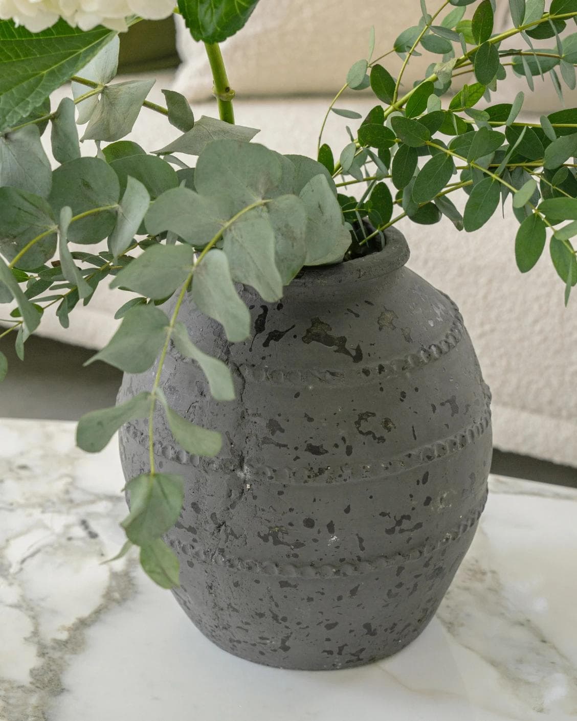 Maxwell Arneson vases in grey, shown in a lifestyle front view as image 4
