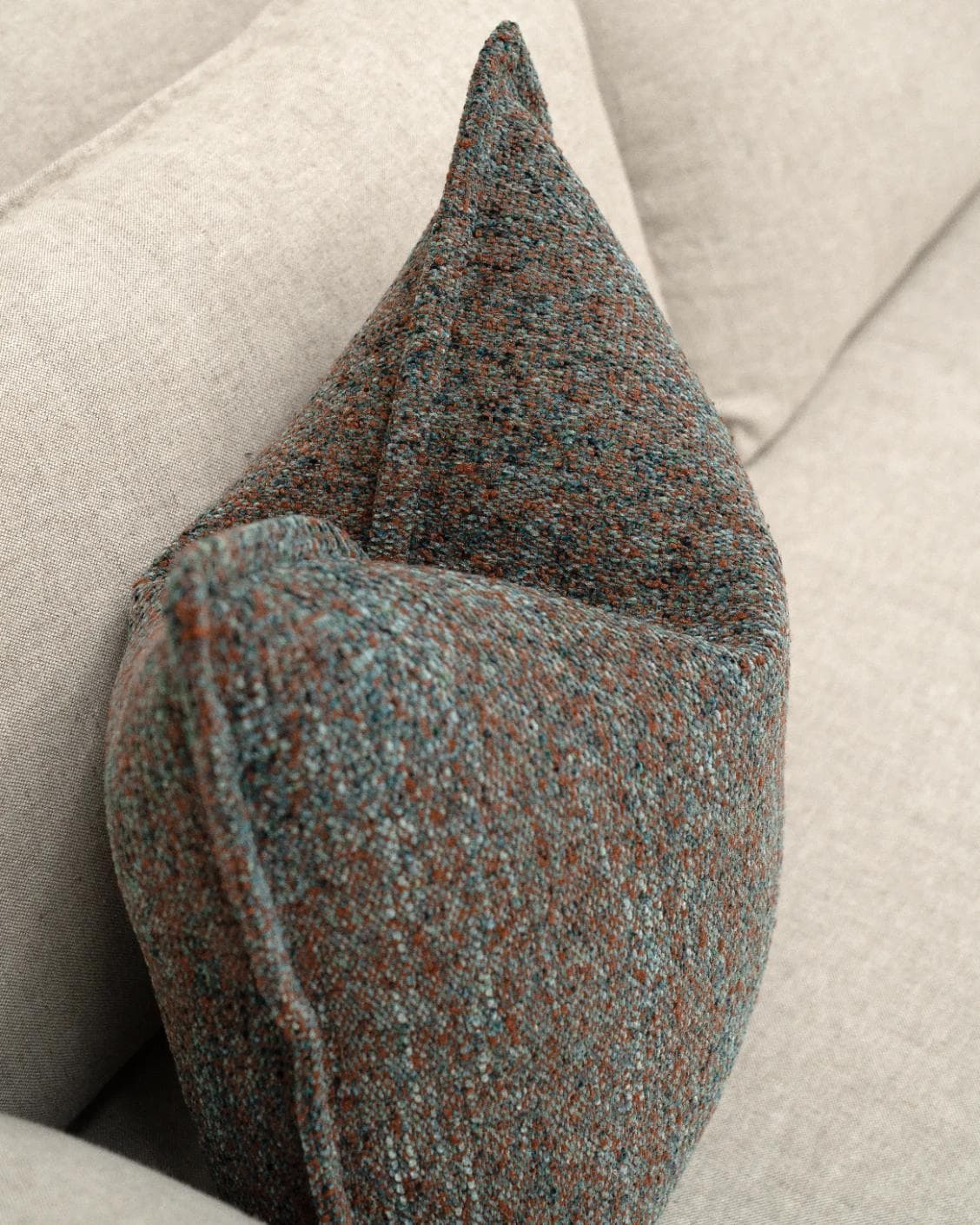 May Chromix cushion in blue and multicolour, shown in a lifestyle top view as image 5