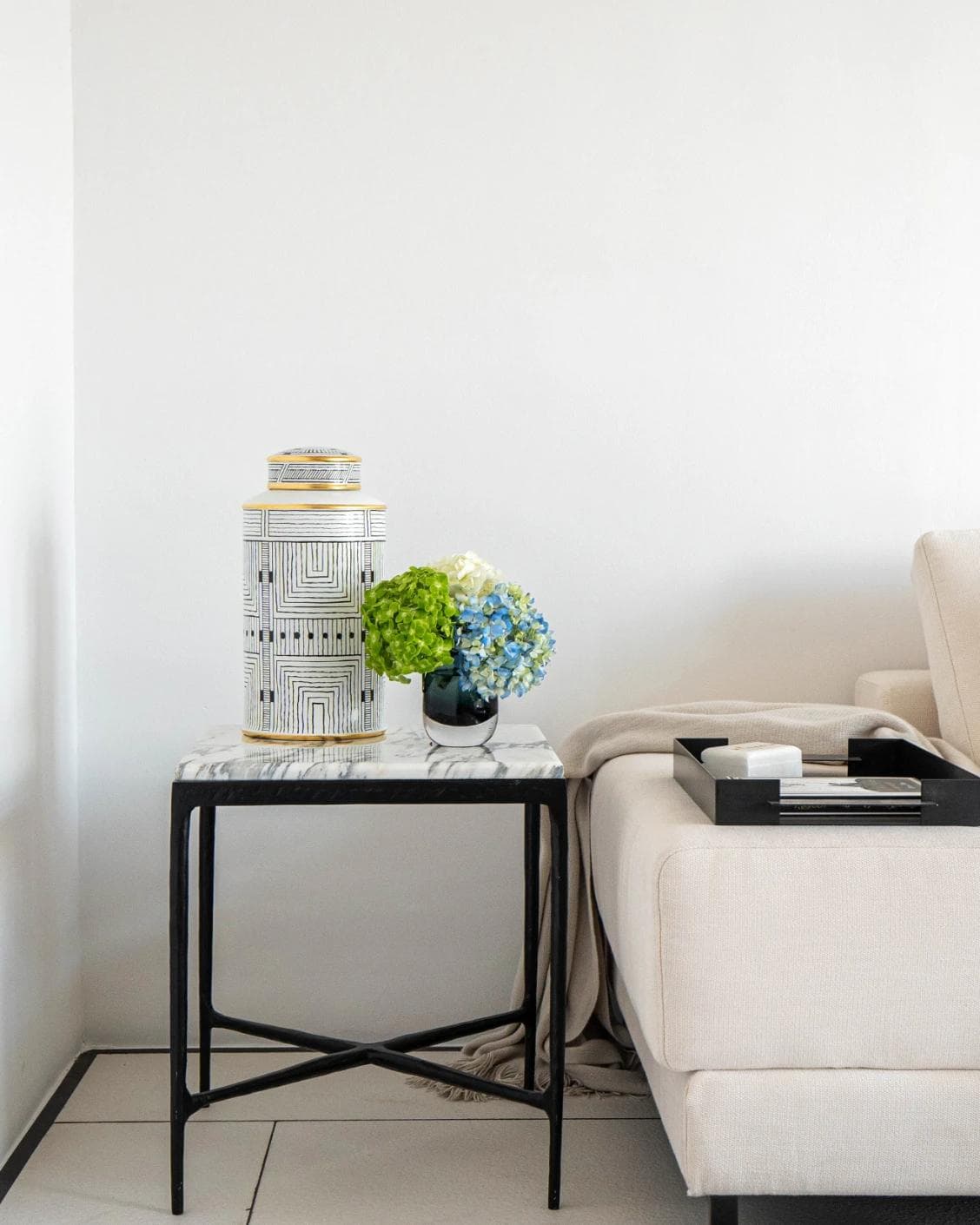 Maze Arneson canisters in black and white, shown in a lifestyle front view as image 4