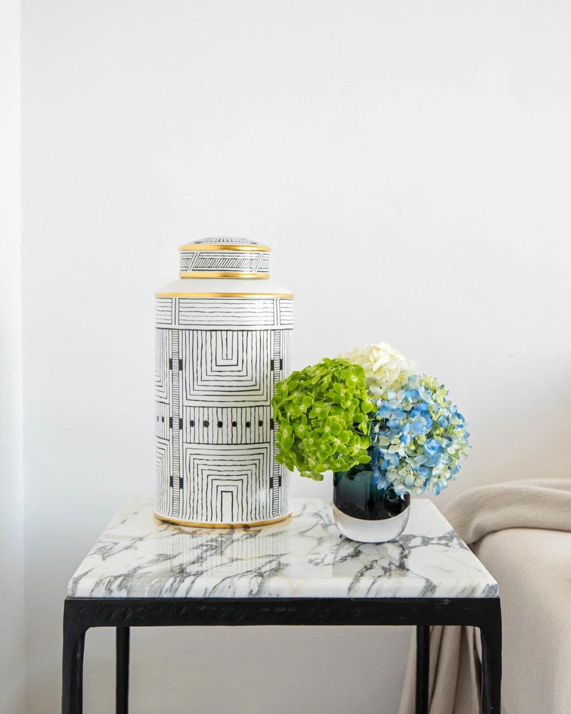 Maze Arneson canisters in black and white, shown in a lifestyle front view as image 5