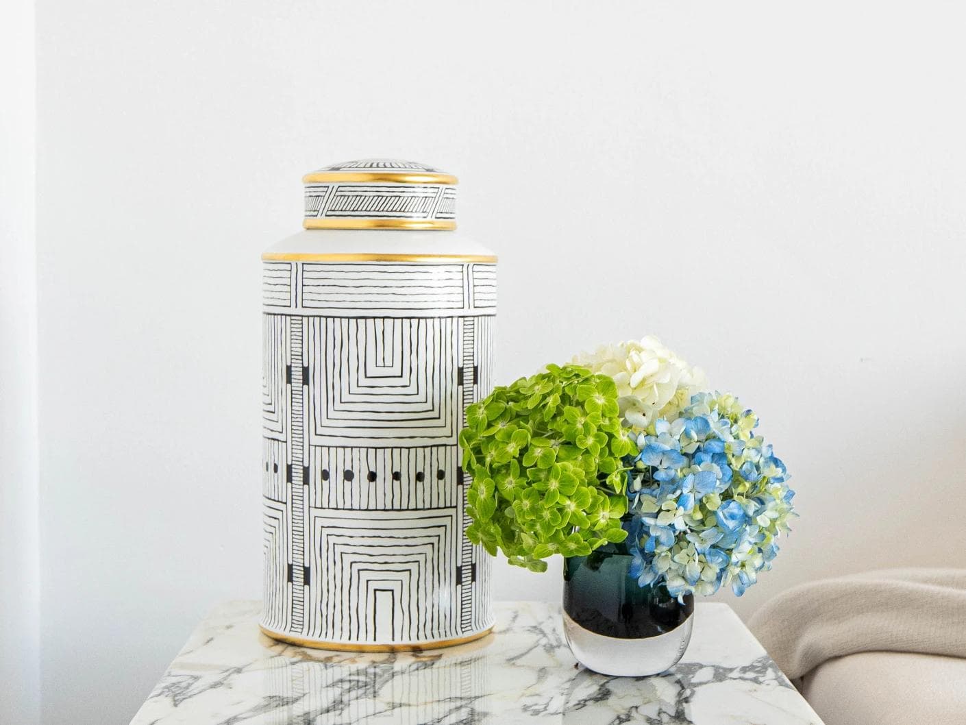 Maze Arneson canisters in black and white, shown in a lifestyle front view as image 5