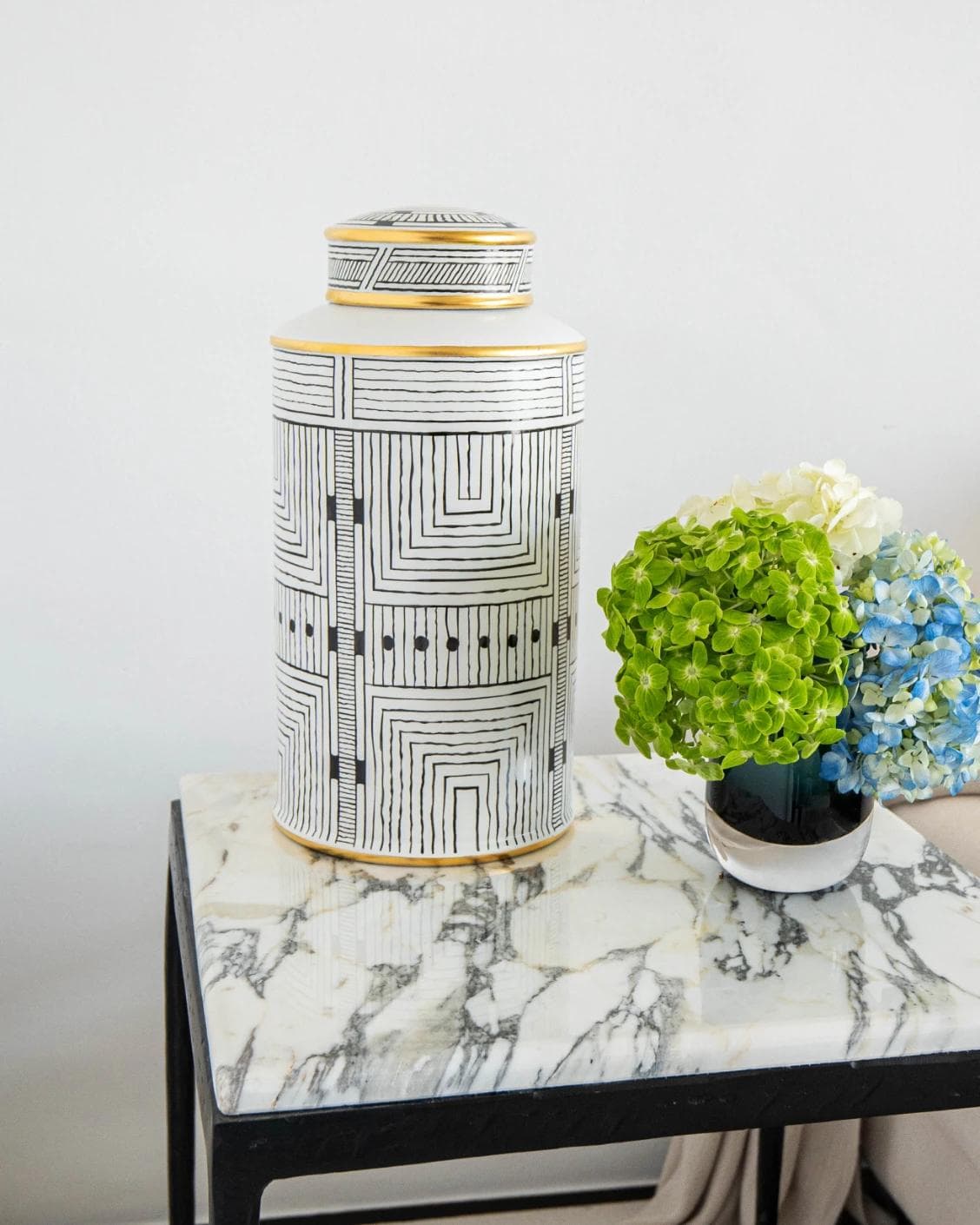 Maze Arneson canisters in black and white, shown in a lifestyle front view as image 6