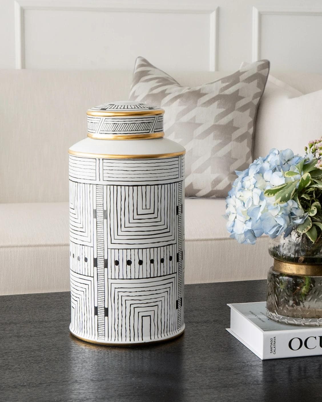 Maze Arneson canisters in black and white, shown in a lifestyle front view as image 10