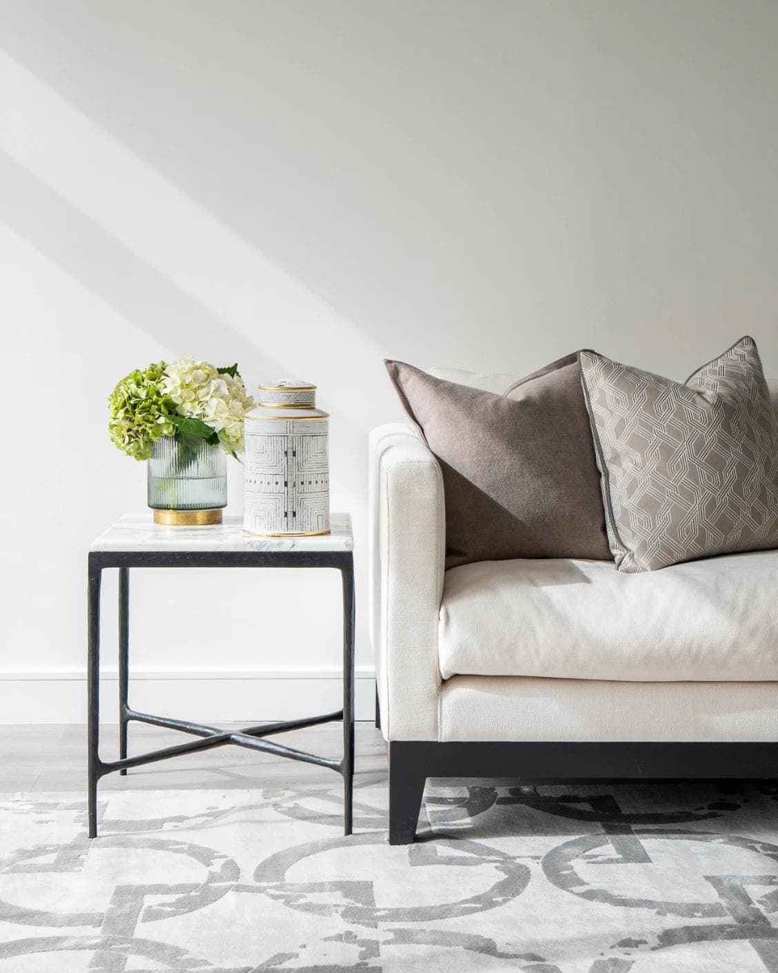 Maze Arneson II canisters in black and white, shown in a lifestyle front view as image 4