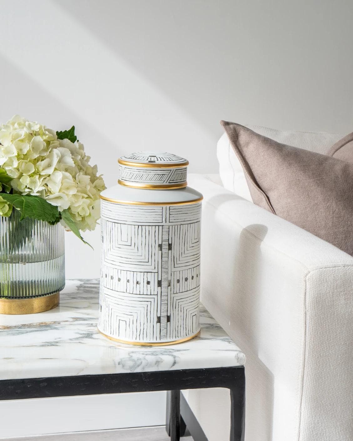 Maze Arneson II canisters in black and white, shown in a lifestyle front view as image 5