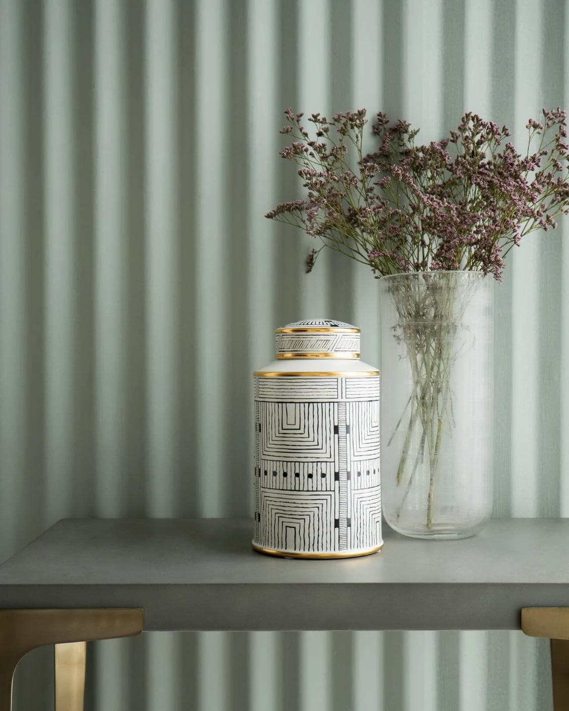 Maze Arneson II canisters in black and white, shown in a lifestyle front view as image 6